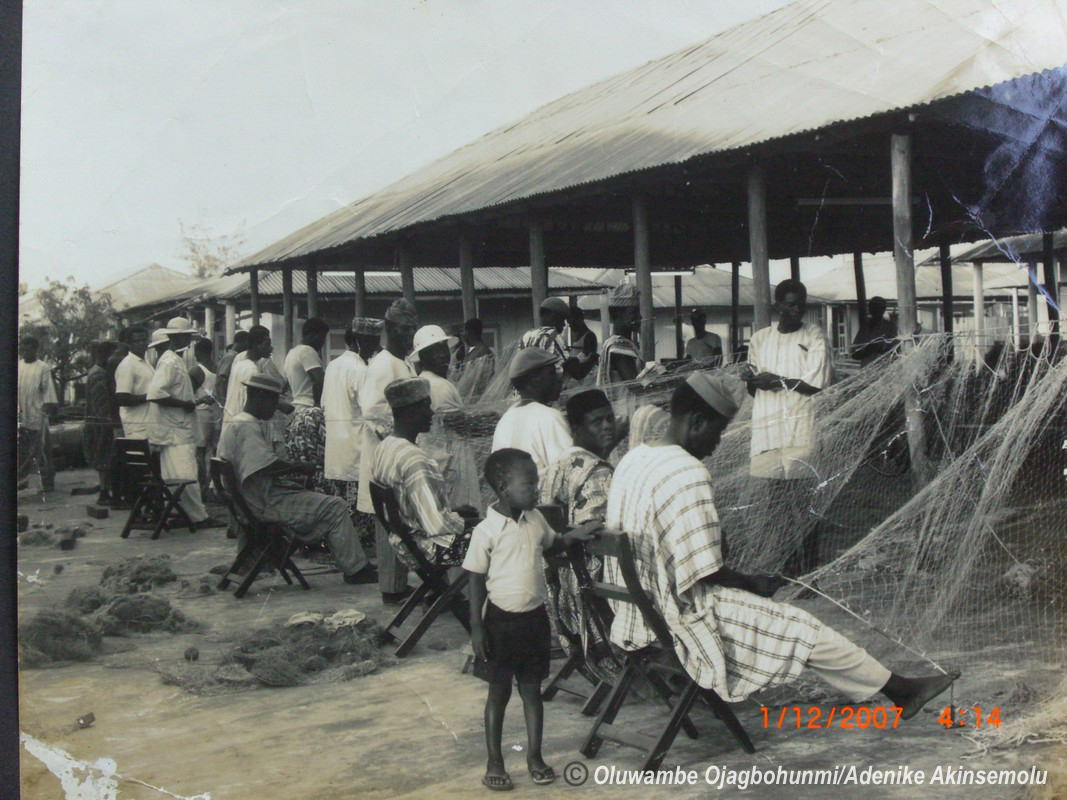 Fishermen Preparing Nets Before Dawn
